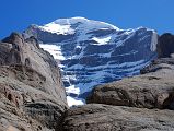 23 Mount Kailash West Face From Just Before Tamdrin On Mount Kailash Outer Kora The west face of Mount Kailash became visible between the rock ridges of the Lha Chu Valley just before Tamdrin.